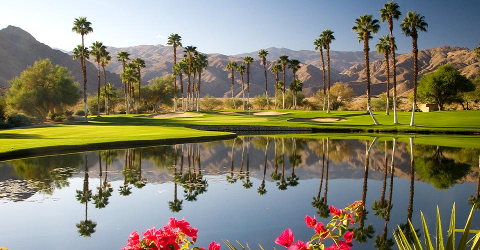 Ironwood Country Club Golf course with mountain range in the background