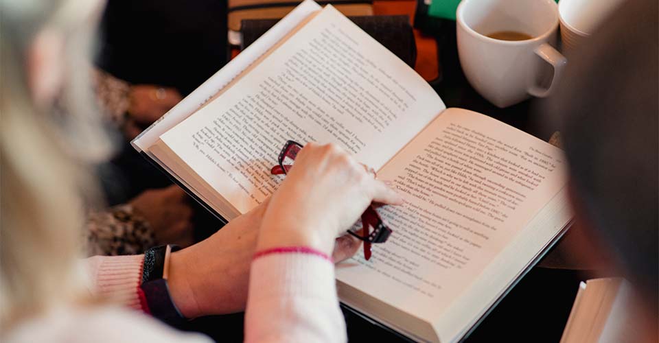 person enjoying book club