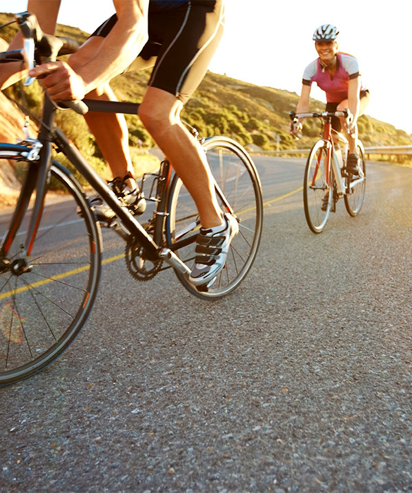 Two cyclist on a mountain road