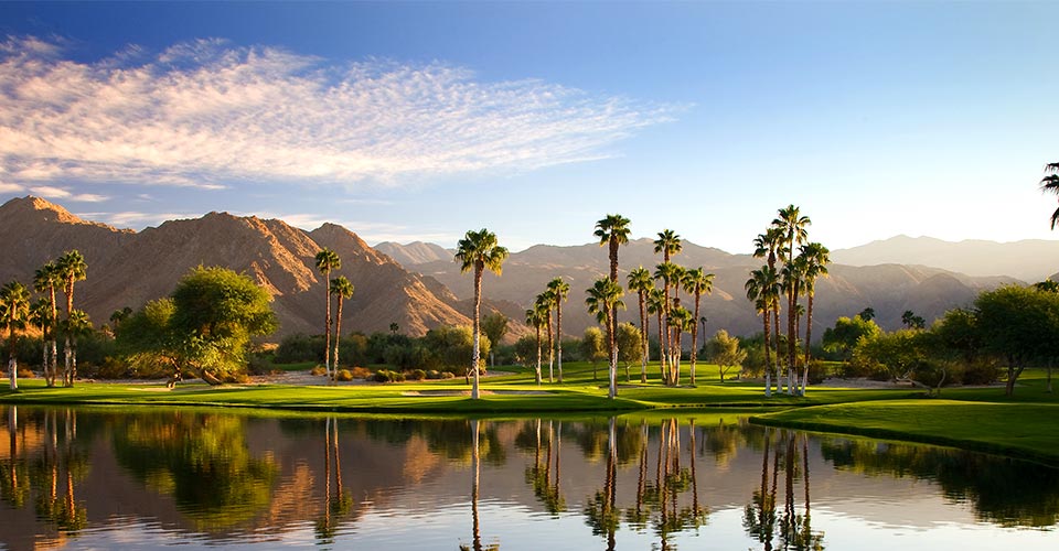 Ironwood Country Club Golf course with mountain range in the background
